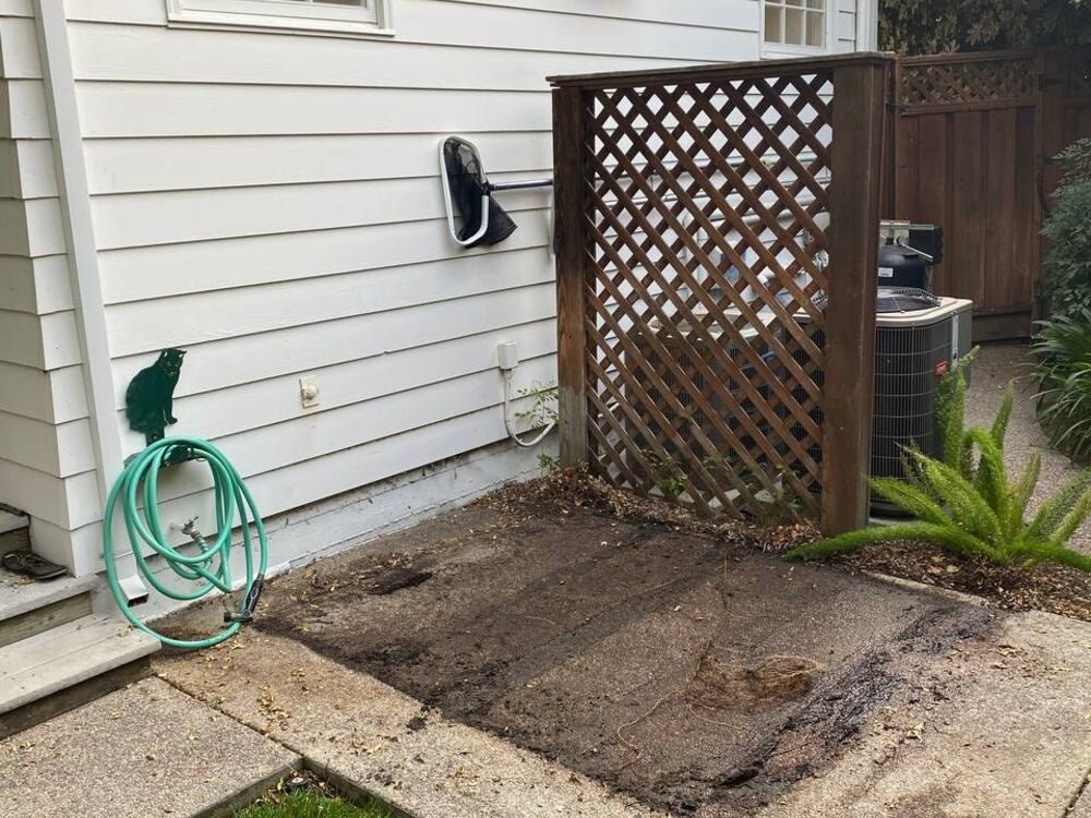 After: the same concrete pad with the hot tub removed